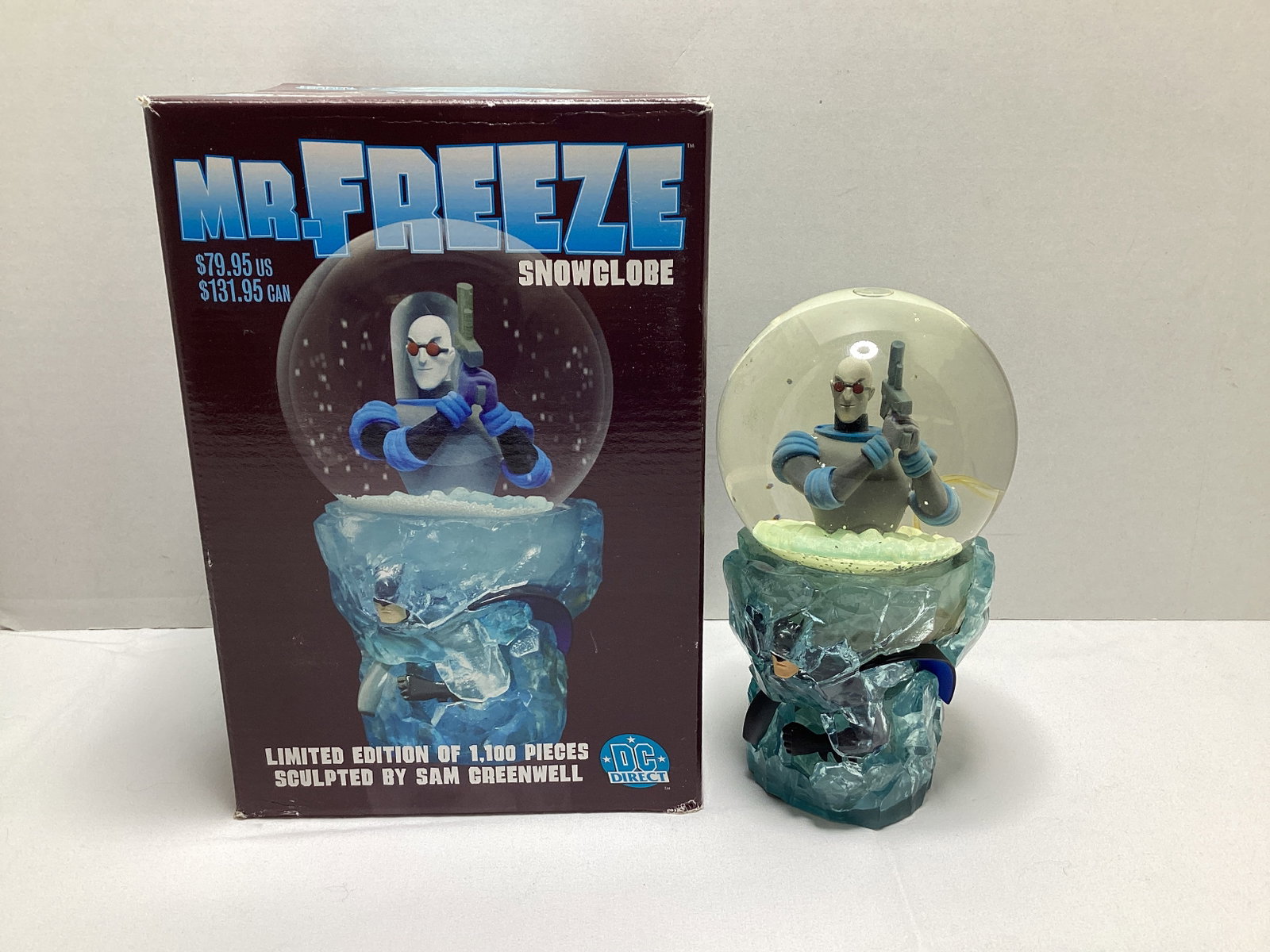 DC Direct Mr Freeze Snowglobe: helmet has been removed and is floating in snowglobe