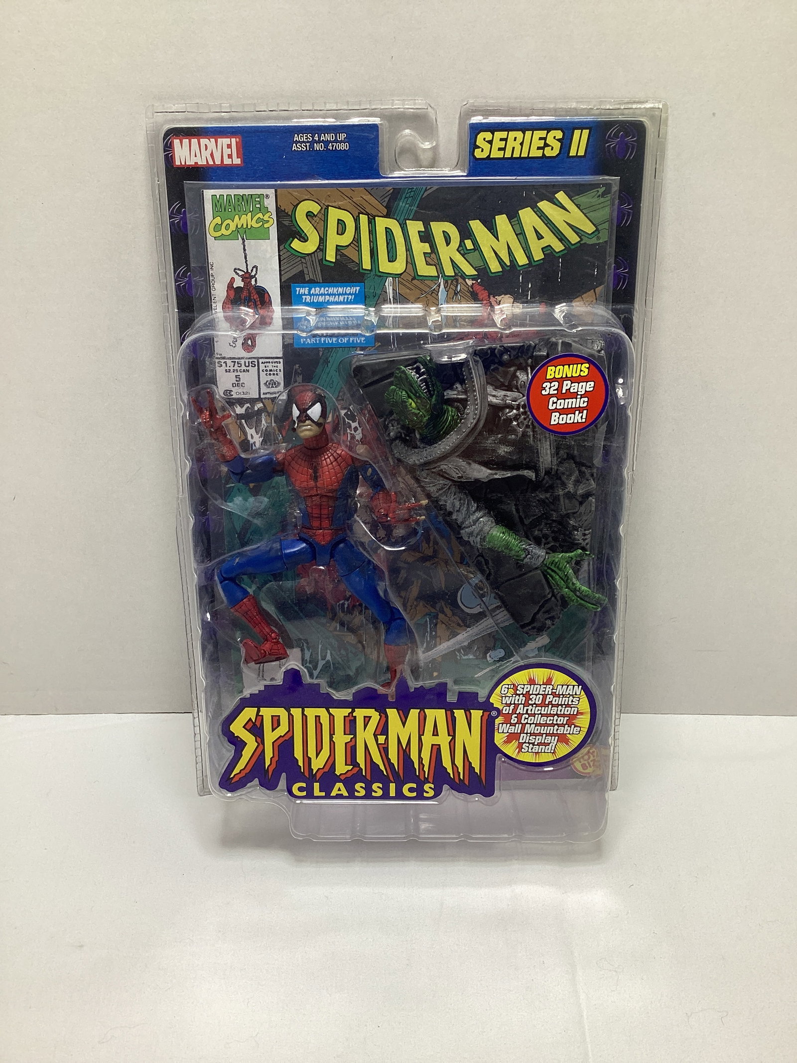 Toy Biz Spider-Man Classics Battle Ravaged Action Figure with Comic Book: .