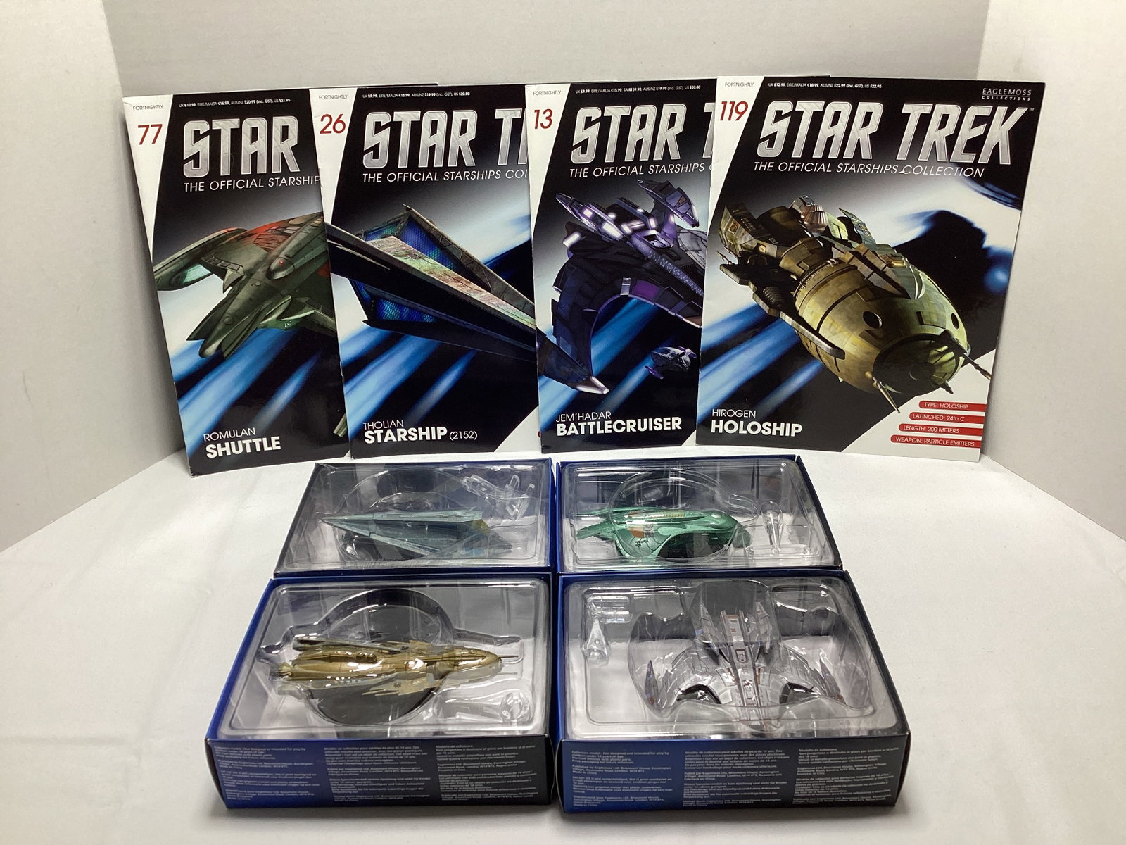Four Eaglemoss Star Trek Diecast Starships with Magazines: appears new in box, Hirogen Holoship, Jem'hadar Battlecruiser, Tholian Starship, Romulan Shuttle