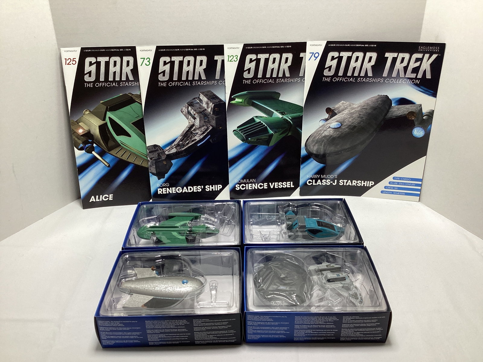 Four Eaglemoss Star Trek Diecast Starships with Magazines: appears new in box, Harry Mudd's Class J Starship, Romulan Science Vessel, Borg Renegades' Ship, Alice
