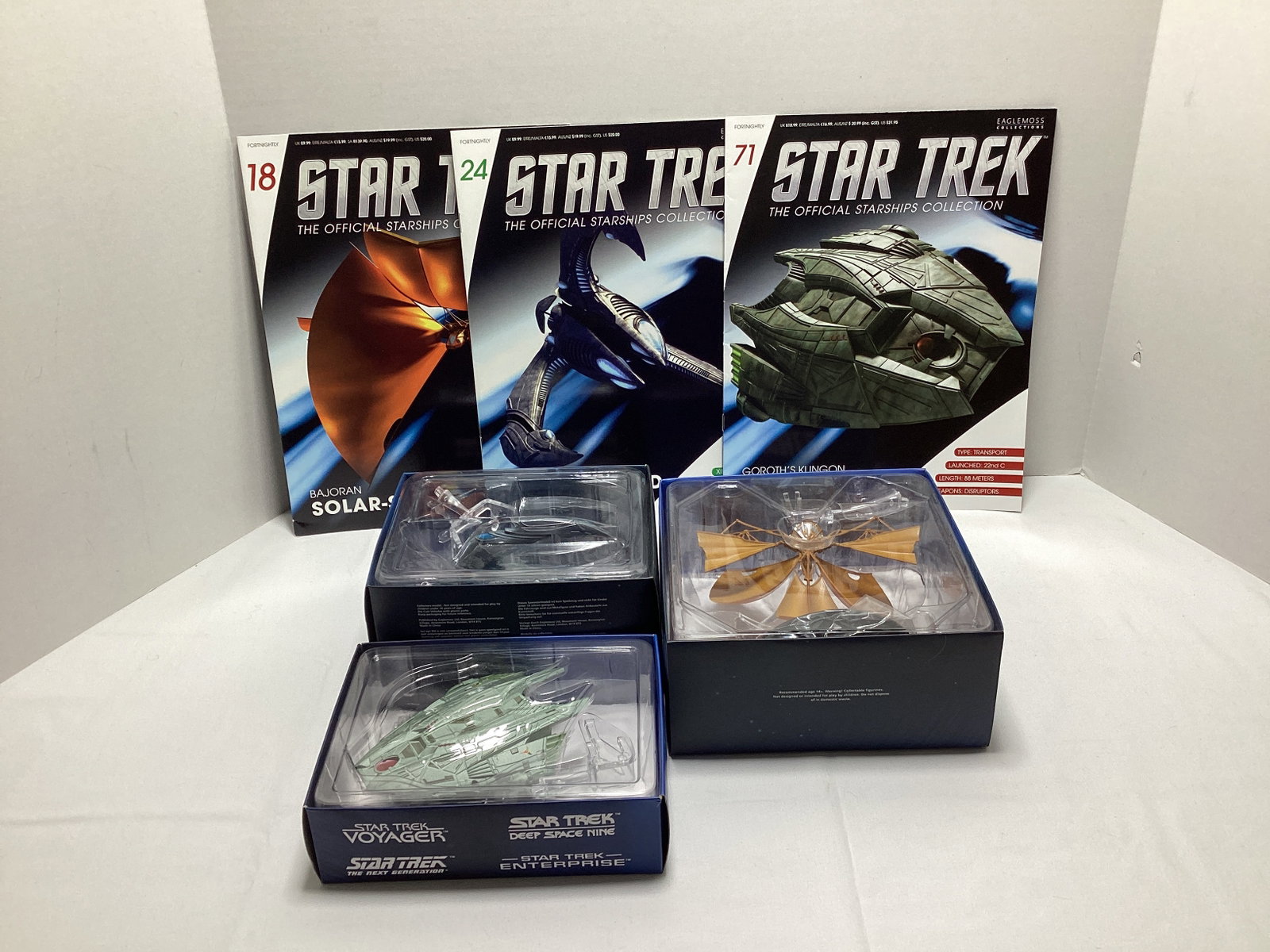 Three Eaglemoss Star Trek Diecast Starships with Magazines: appears new in box, Goroth's Klingon Transport Ship, Xindi Insectoid Warship, Bajoran Solar-Sailor