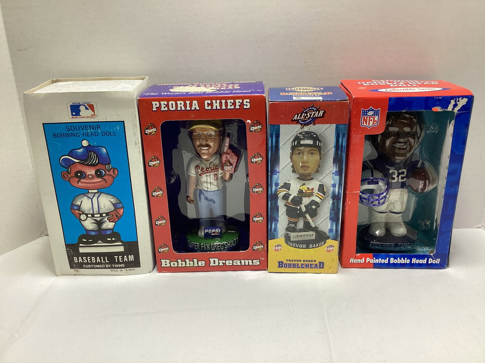 Four Bobbleheads: .