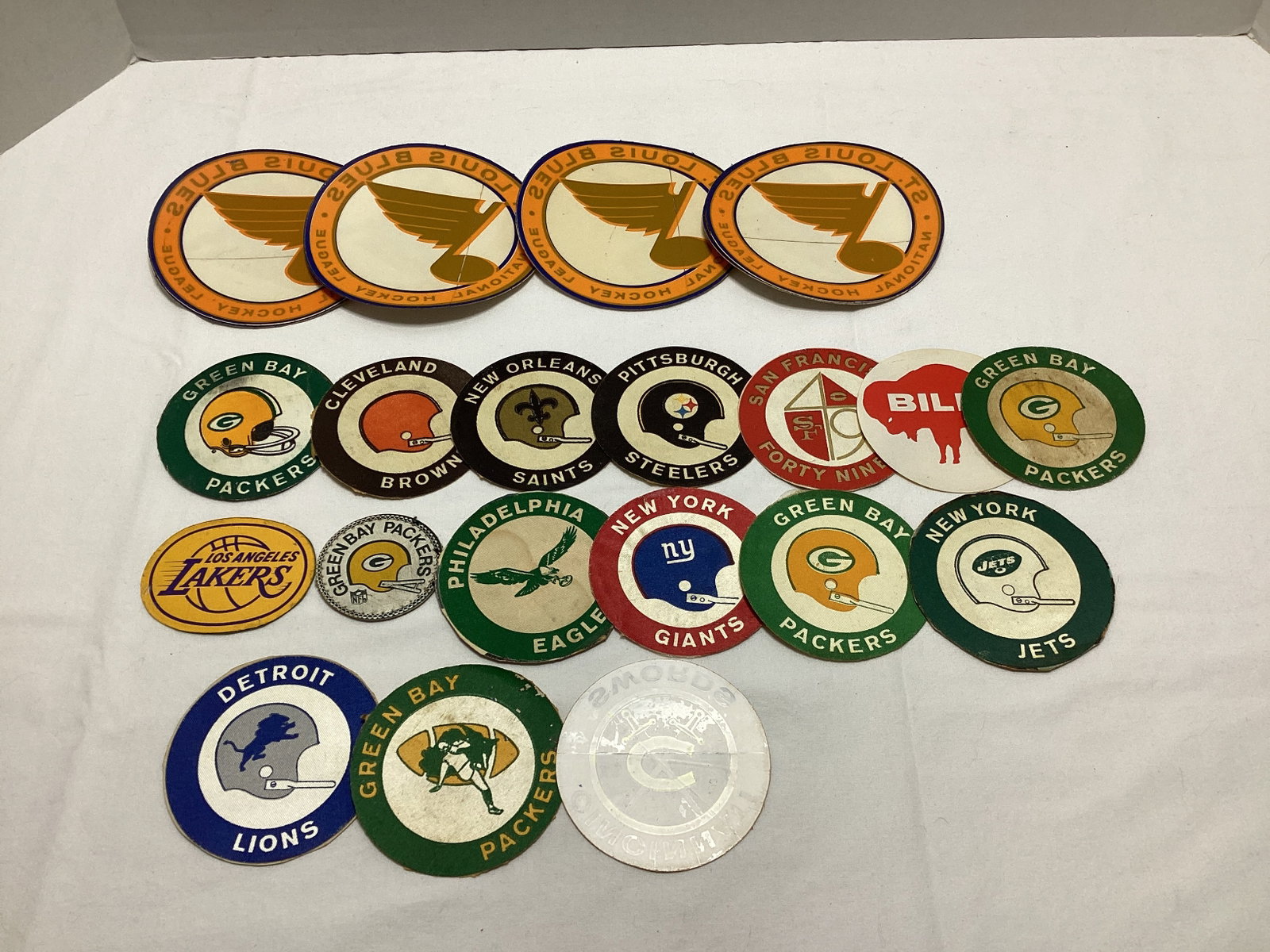Vintage Sports Logos: appear to be used stickers that have been either cut out or peeled off. Some new
