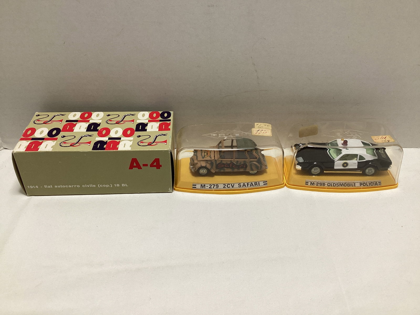 Three Diecast Model Cars: .