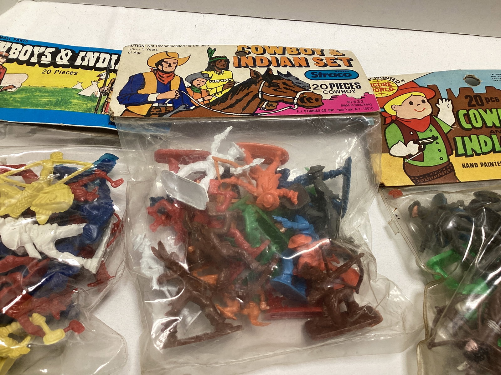Four Cowboy and Indian Plastic Figure Sets - 4