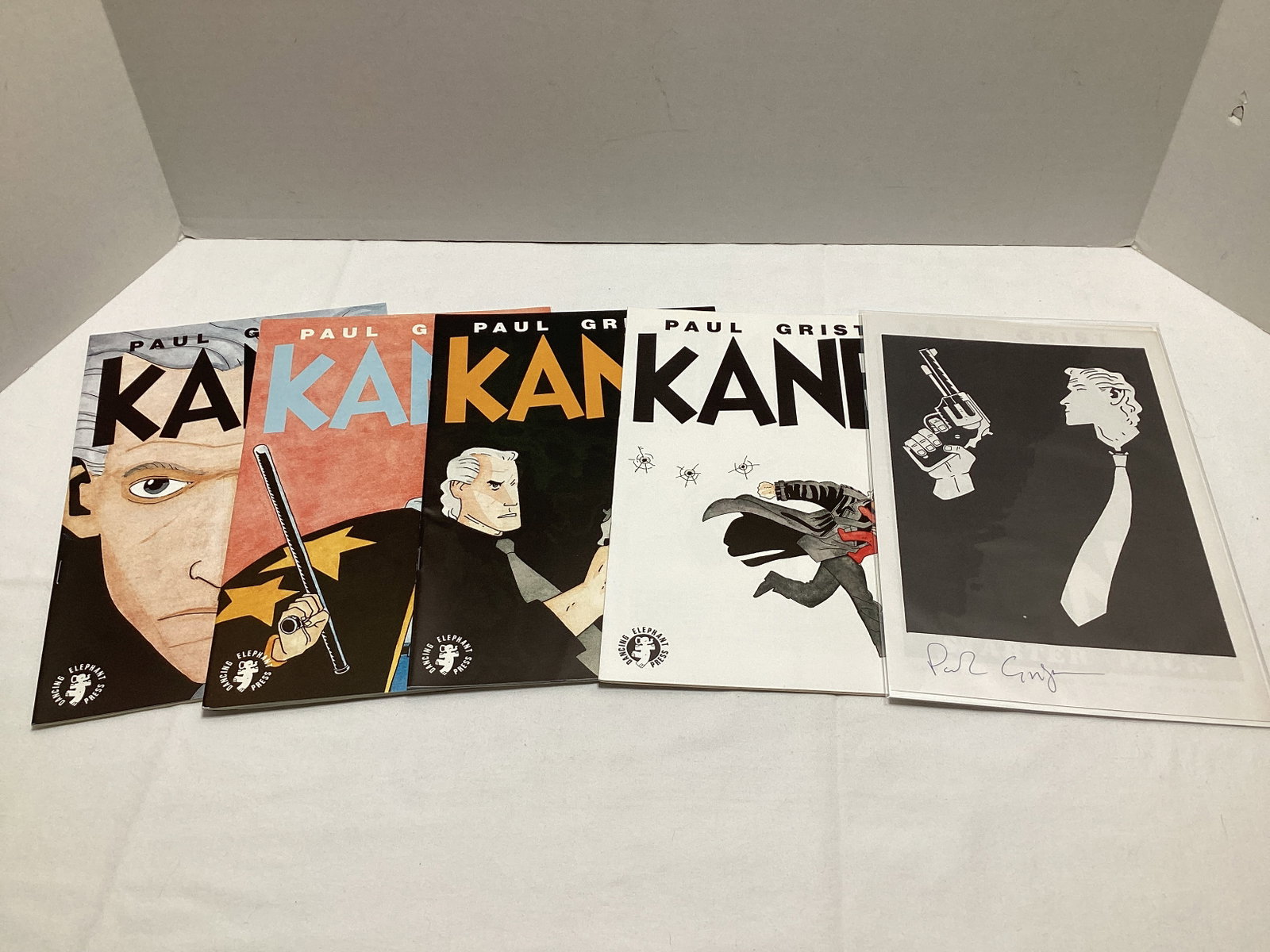 Four Kane Comic Books and Paul Grist Signed Print: .
