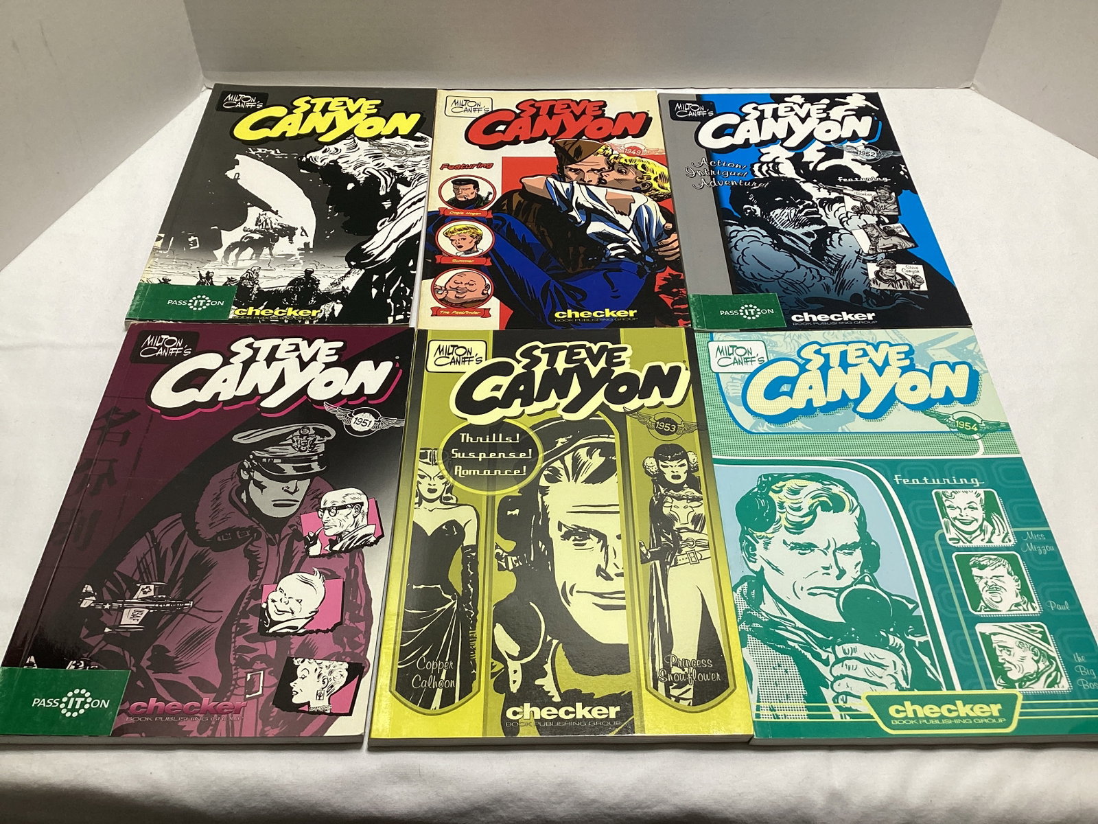 Six Steve Canyon Graphic Novels: .