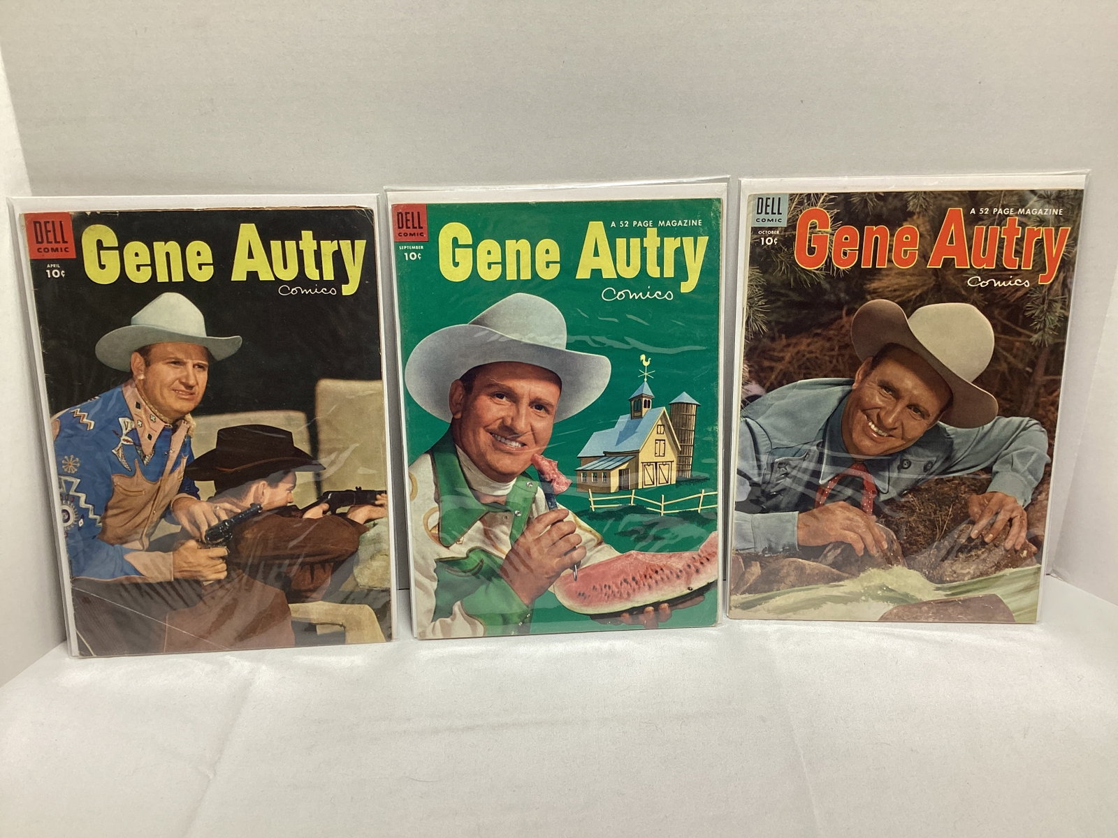 Three Gene Autry Dell Western Comic Books: .