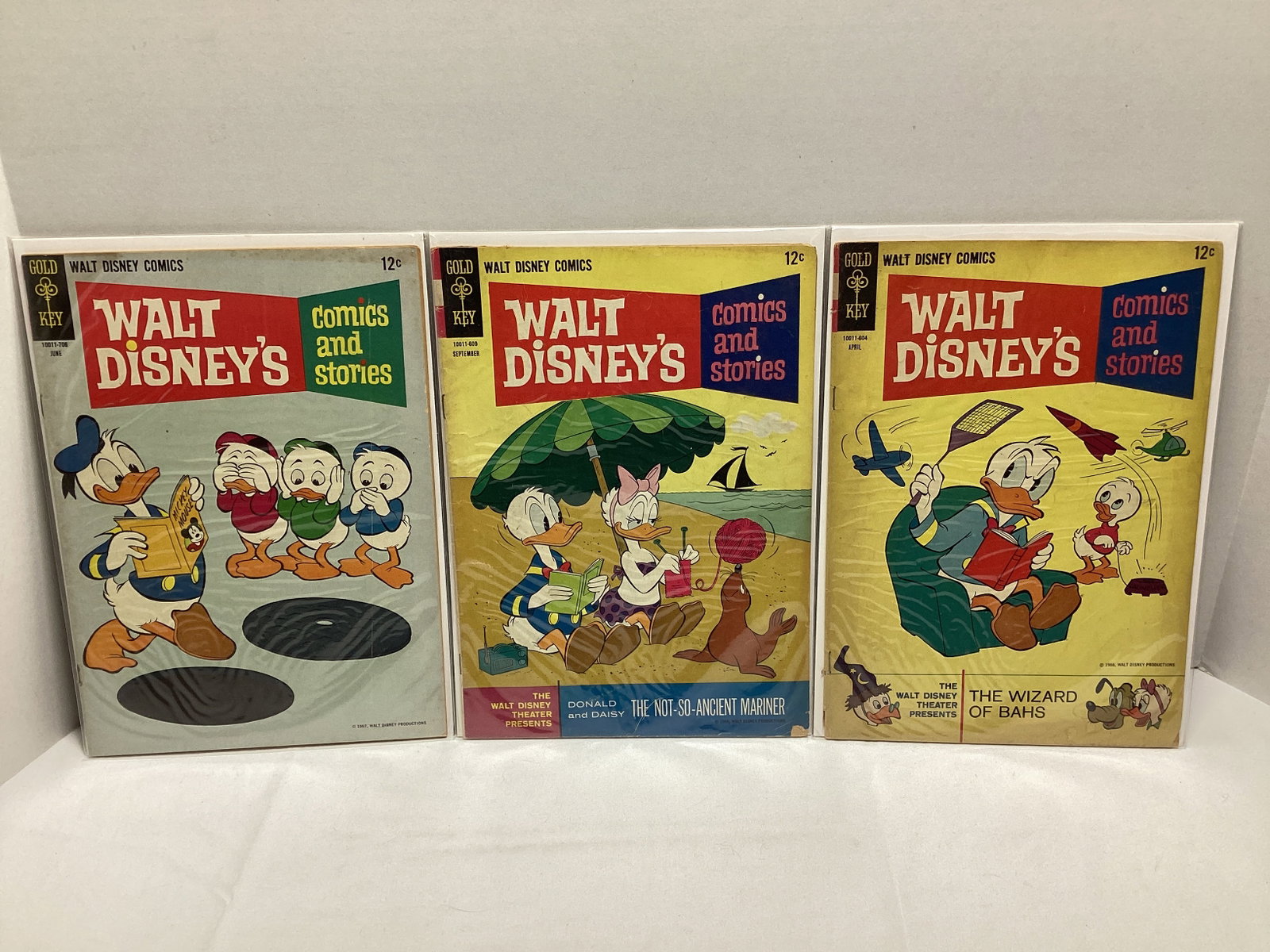 Three Walt Disney's Comics and Stories Gold Key Comic Books: .