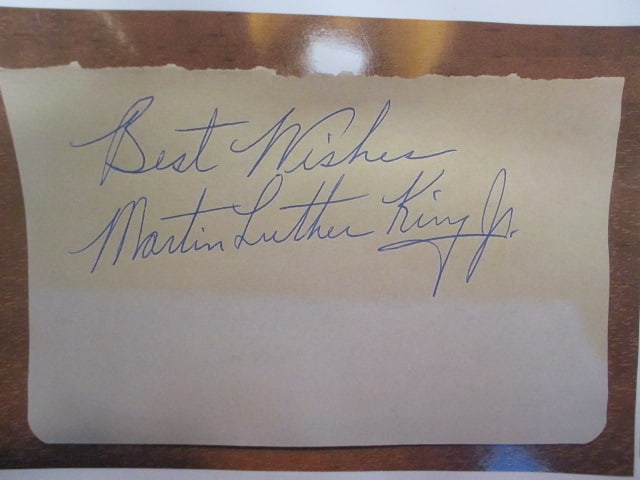 Martin Luther King Jr. Signed Album Book Page: This rare and historically significant album book page bears the authentic signature of Dr. Martin Luther King Jr., one of the most influential leaders of the 20th century and the central figure of th