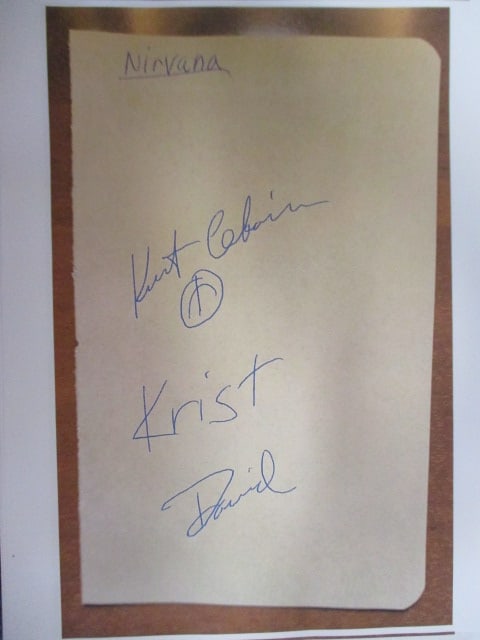 Kurt Cobain and Nirvana Signed Album Book Page (1 of 1)