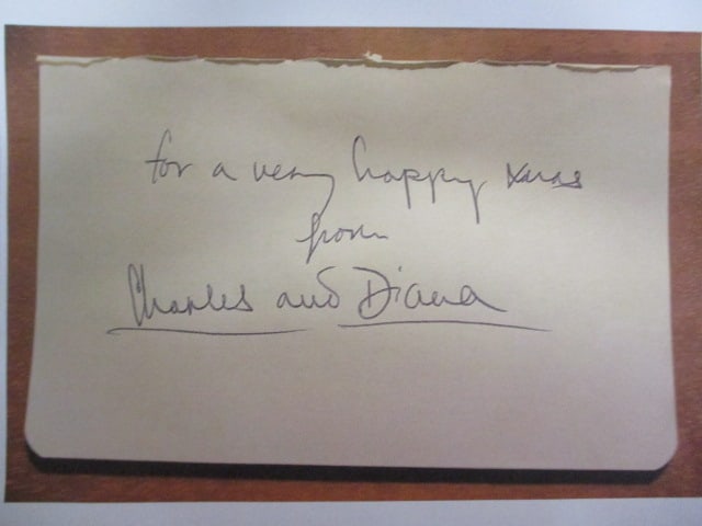 Charles and Diana Signed Album Book Page: Offered here is a rare and historically significant album book page signed by Charles, Prince of Wales, and Diana, Princess of Wales. As one of the most famous royal couples in modern history, their m