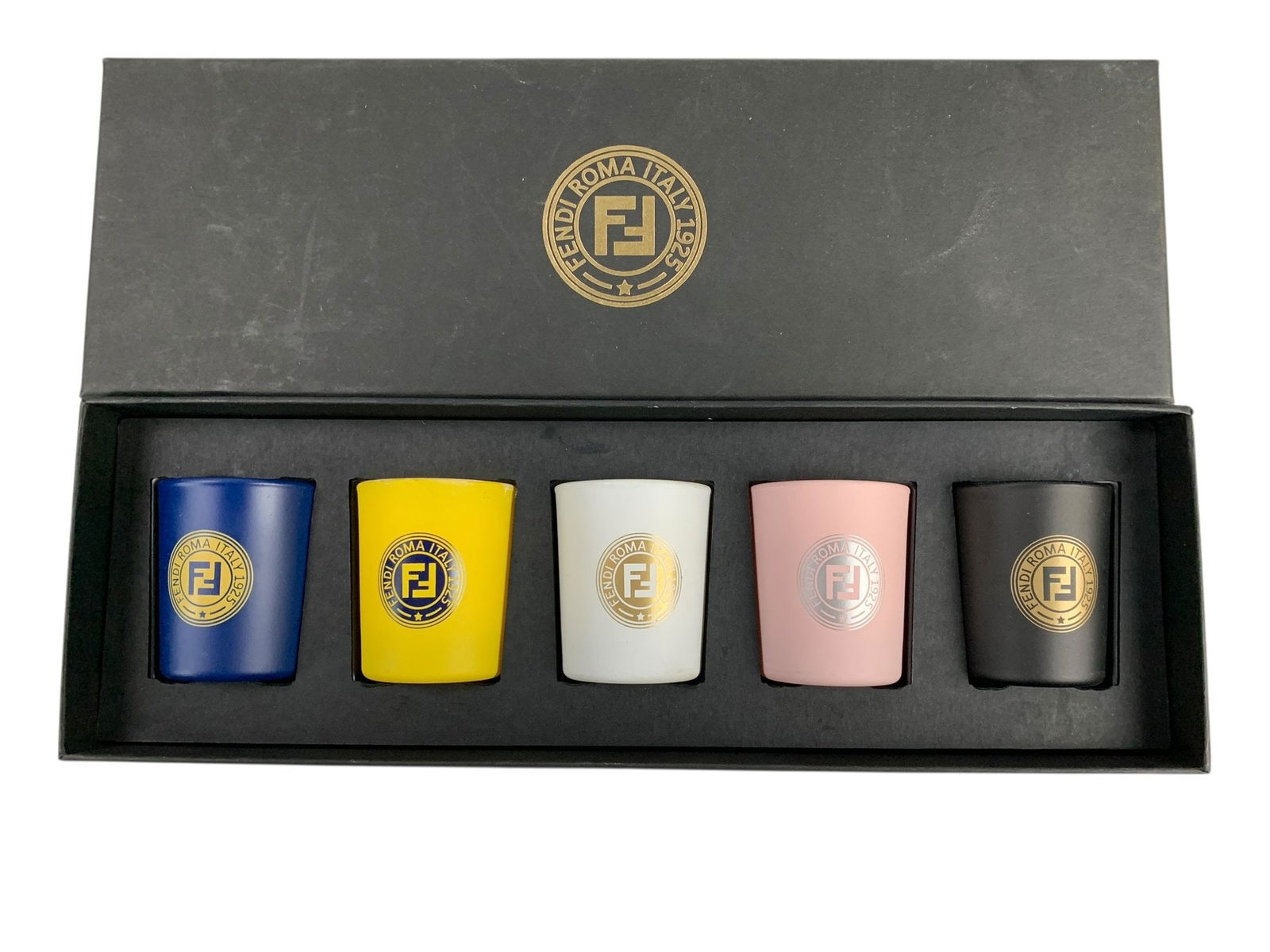 Fendi Logo Scented Candle Set (Set Of 5) - #S15-3: Set of five Fendi logo scented votive candles with multicolor matte finish glass jars and original box. Made in France. Box shows light wear. LOCAL PICK-UP: SATURDAY, FEBRUARY 21ST FROM 11AM-3PM. LOCA