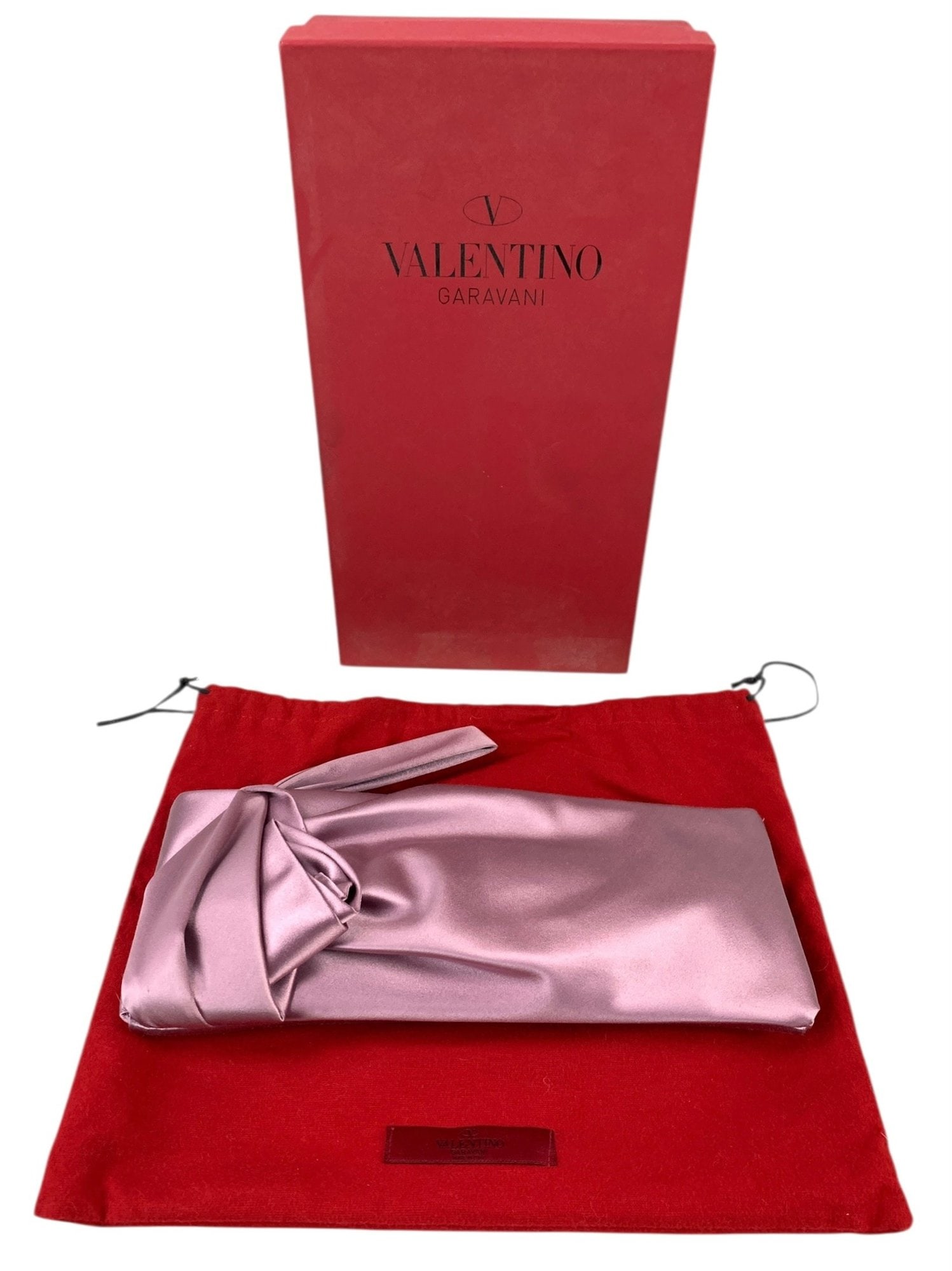 Valentino Garavani Lavender Silk Clutch (Made In Italy) - #S9-2: Includes original box and dust bag. Features a wrist strap and zippered closure. Lined in black fabric with signature red VALENTINO GARAVANI tag at interior. Condition: new, unused. Dimensions: 11-1/4