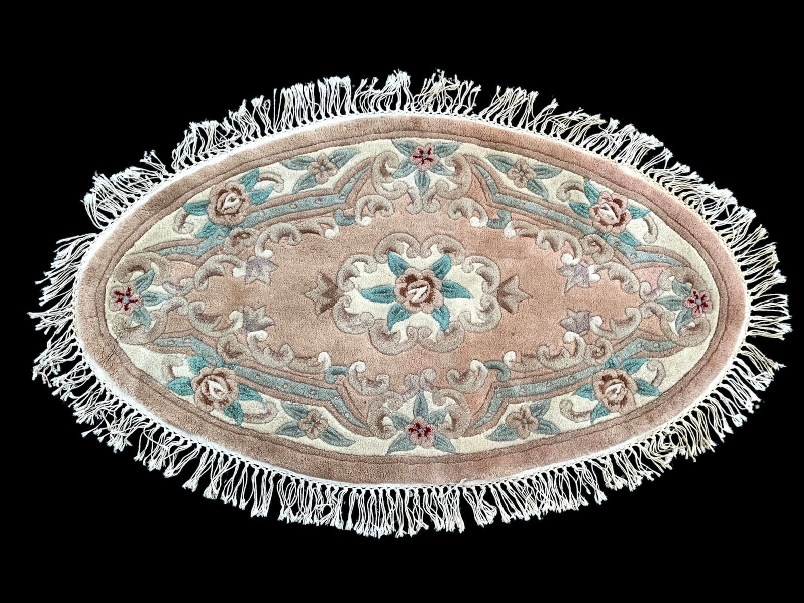 Chinese Art Deco Fringed Oval Rug - #S3-5: Features a traditional oriental floral pattern in pastel colors. Age appropriate wear consistent with normal usage. Measurements: 36"W x 58"L LOCAL PICK-UP: SATURDAY, FEBRUARY 21ST FROM 11AM-3PM. LOCA