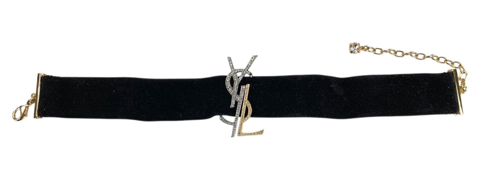 YSL Logo Yves Saint Laurent Velvet And Rhinestone Choker - #S18-3: Featuring gold-tone metal hardware, a velvet strap, monogram logo emblem set with clear rhinestones. Lobster claw clasp closure. Condition: very good pre-owned condition. Dimensions: 2"H x 14"L LOCAL