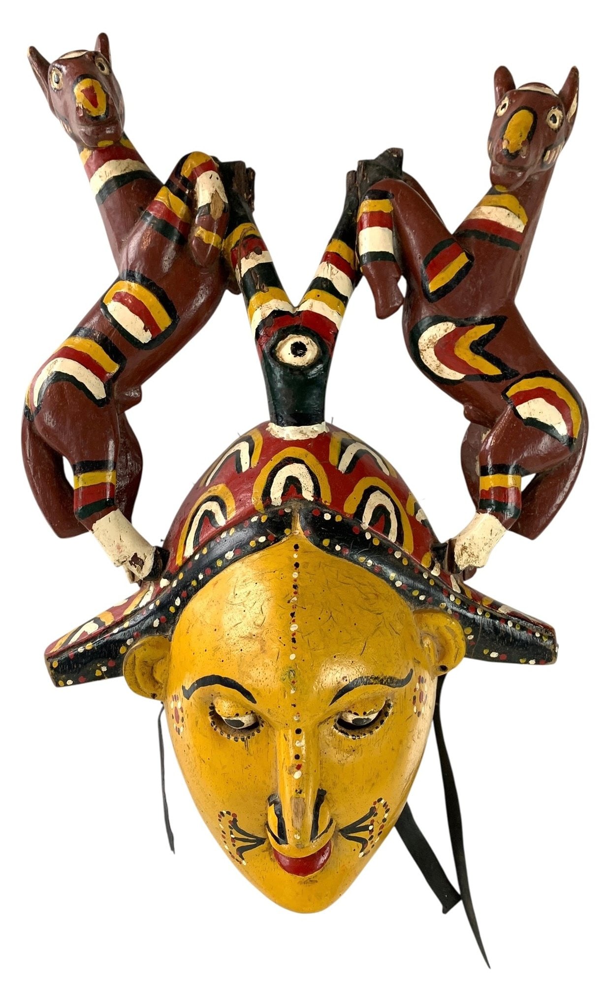 African Carved Wood Ceremonial Mask With Equestrian Finials - #S18-3: Hand carved and painted. Age appropriate wear noted. Measurements: 20"H x 13"W x 6"D LOCAL PICK-UP: SATURDAY, FEBRUARY 21ST FROM 11AM-3PM. LOCATION: 35 MECHANIC STREET, AMENIA, NY 12501 INVOICES MUST