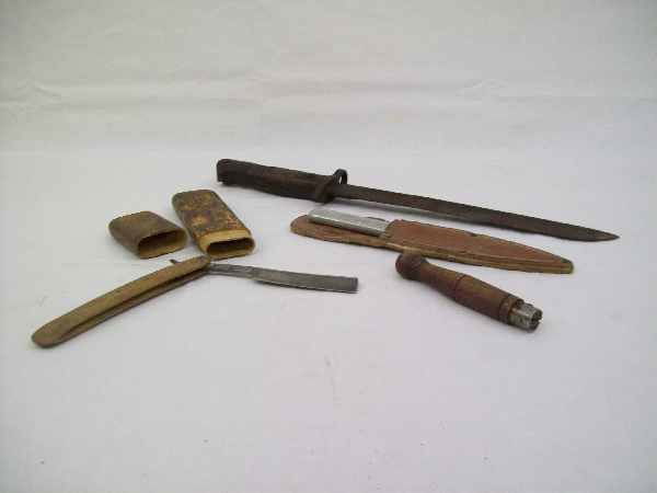 Knives: 4 items including - Antique razor & case JR Torrey Co.; Old jack knife (penny knife); WWI soldiers boot knife (US trench knife) dated 1917; WWI cut down bayonet 4 1 2/ inches long - 15 inches long