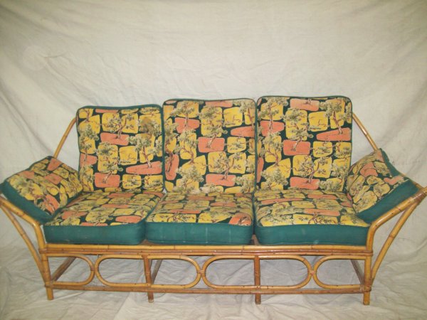 Furniture: Rattan couch & chair. Coushins have tears. Couch measures 77 inches long x 29 inches deep x 31 inches high