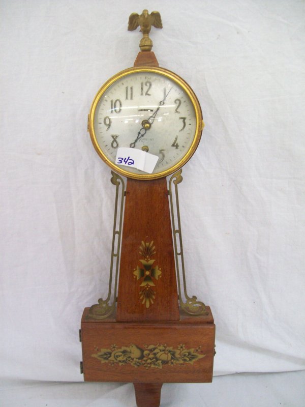 CLOCK: SESSIONS WALL CLOCK. 23 INCHES HIGH X 7 1/2 INCHES WIDE