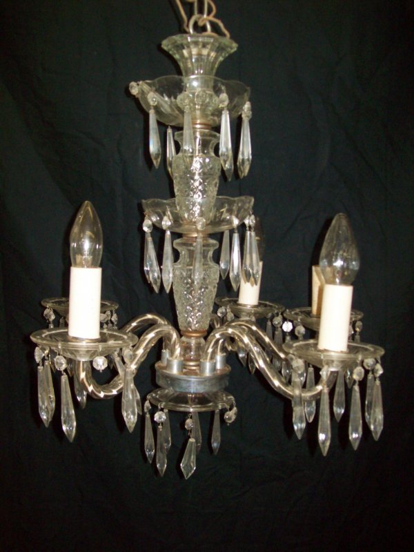 LIGHTING: CRYSTAL CHANDELIER. 22 INCHES HIGH X 21 INCHES WIDE