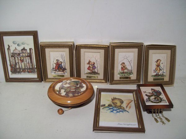 HUMMEL: 8 HUMMEL PRINTS INCLUDING MINI CLOCK. LARGEST MEASURES 7 INCHES HIGH X 5 INCHES WIDE.