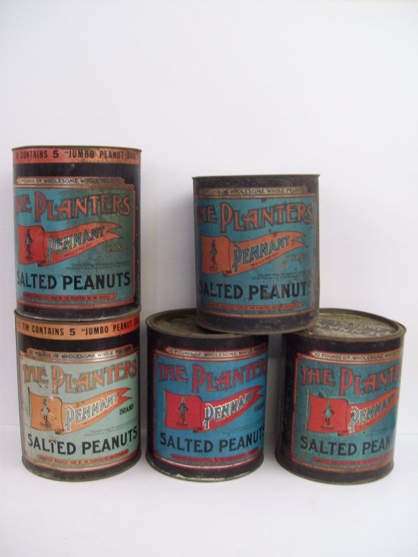 THE PLANTERS SALTED PEANUTS TINS: 5 THE PLANTERS PEANUTS SALTED NUTS TINS. RUST THROUGHOUT, MINOR DENTS, PAINT LOSS. LARGEST MEASURES 10 1/2 INCHES HIGH X 8 1/2 INCHES WIDE
