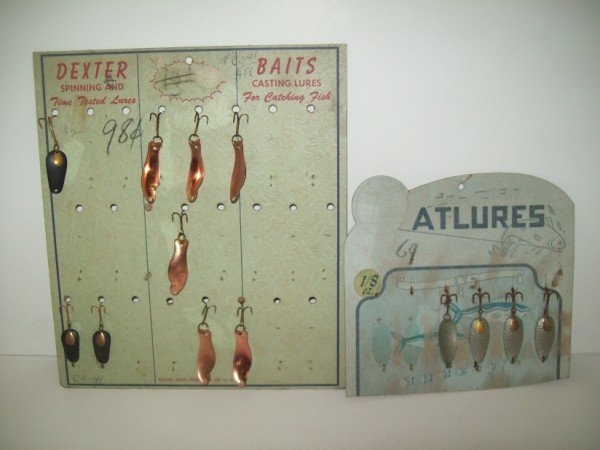 FISHING LURE CARDBOARD ADVERTISING DISPLAY: 2 CARDBOARD FISHING LURES ADVERTISING DISPLAY INCLUDING DEXTER & ATLURES. WORN, STAINED CONDITION.