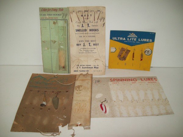 FISHING LURES DISPLAY: COLLECTION OF FISHING CARDBOARD DISPLAYS. STAINED; WEAR; TORN; USED CONDITION.