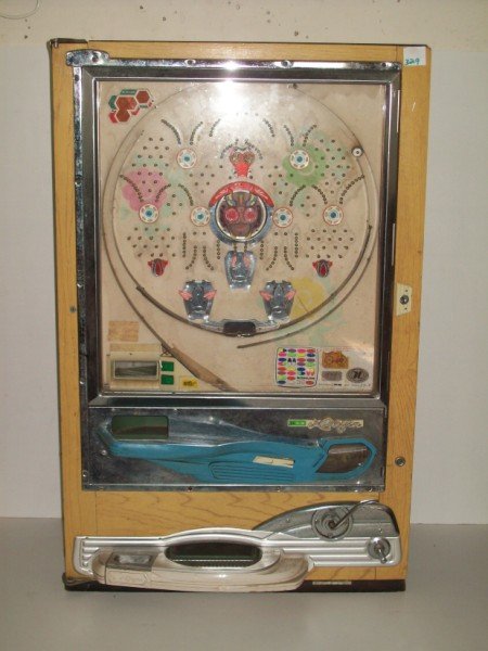 PACHINKO MACHINE: PACHINKO MACHINE MADE BY NISHIJIN TOKYO JAPAN WITH INSTRUCTION BOOK. 20 1/2 INCHES X 32 INCHES.