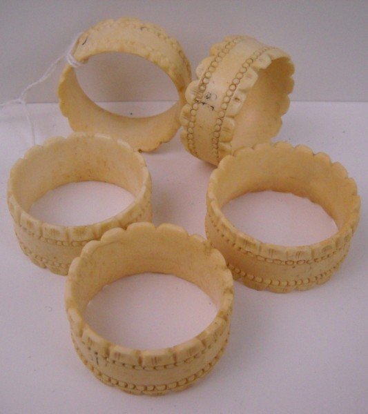 IVORY NAPKIIN RINGS: 5 IVORY NAPKIIN RINGS (WE DO NOT EXPORT IVORY) 2 INCHES DIAM.