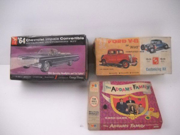 MODEL KITS; CARD GAME: 64 CHEVROLET IMPALA CONVERTIBLE MODEL KIT; '32 FORD V- THE "DUCE" MODEL KIT; THE ADDAMS FAMILY CARD GAME. USED CONDITION