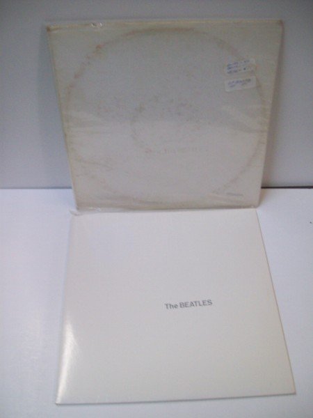 RECORD ALBUM: 2 BEATLES WHITE ALBUMS, CAPITOL RECORDS LABEL, WHITE VINYL; 1 SEALED A2415389 1ST PRESSING.