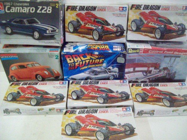 MODEL KITS: 10 CAR MODEL KITS. USED CONDITION. LARGEST MEASURES 10 INCHES HIGH X 7 INCHES WIDE