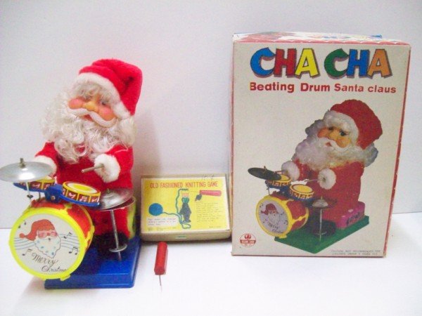 TOY: CHA CHA BEATING DRUM SANTA CLAUS IN ORIGINAL BOX & OLD FASHION KNITTING GAME. WEAR; USED CONDITION. 11 INCHES HIGH X 8 INCHES HIGH