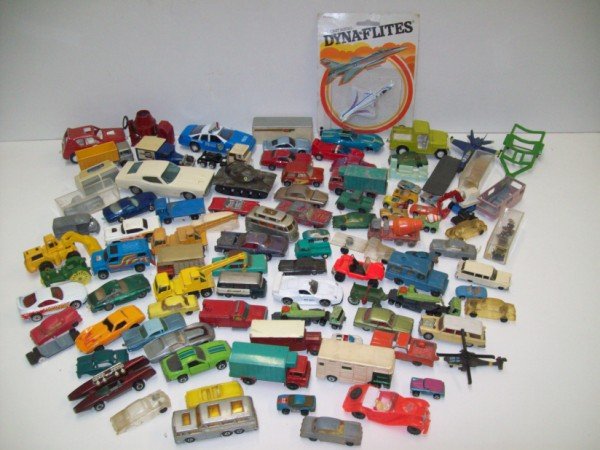 TOYS: VAROUS TOY CARS; TRUCKS; PLANE; HELICOPTER. INCLUDING LESNEY; HOTWHEELS; MATCH BOX. PAINT LOSS; PEALING; SCRATCHES; SOME PARTS LACKING.