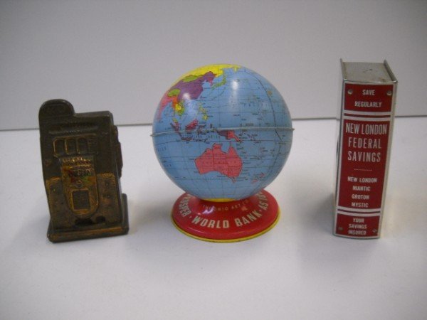 BANKS: 3 BANKS INCLUDING THE WORLD BY OHIO ART CO; NEW LONDON FEDERAL SAVINGS BOOK BANK BY STANDARD THRIFT CO.; DIE CAST SLOT MACHINE BANK. SCRATCHES; PAINT LOSS; USED CONDITION. LARGEST MEASURES 5 INCHES X 