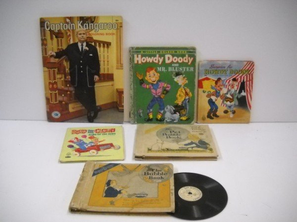 BOOKS/RECORD BOOKS: CHILDRENS BOOKS INCLUDING CAPT. KANGARO COLORING BOOK; HOWDY DOODY; BOZO THE CLOWN; 2 1917 THE BUBBLE BOOK, THE BOOK THAT SINGS RECORD BOOKS. STAINS; WRITTEN ON; USED CONDITION. 11 INCHES X 5 INCHRD