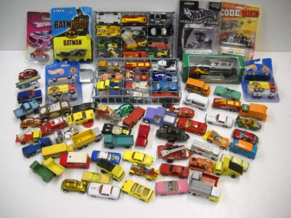 TOY CARS: TOY CARS, TRUCKS INCLUDING SOME IN ORIGINAL PACKAGES; MATCHBOX; HOT WHEELS; CORGI. APPROX. 10. PAINT LOSS; SCRATCHES; USED CONDITION.