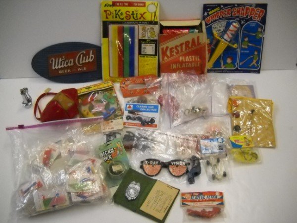 TOYS: TOYS INCLUDING: DETECTIVE BADGE; PIK STIX; X-RAY VISION GLASSES; PURSE; PAINT SET. USED CONDITION. LARGEST MEASURES 10 INCHES