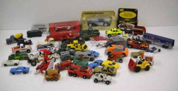 TOY CARS: TOYS CARS SOME DIE CAST; SOME PLASTIC; CORGI; MATCHBOX; TRANSFORMERS; HOT WHEELS; LINDBERG BOX ONLY. SCRATCHES; WEAR; USED CONDITION.