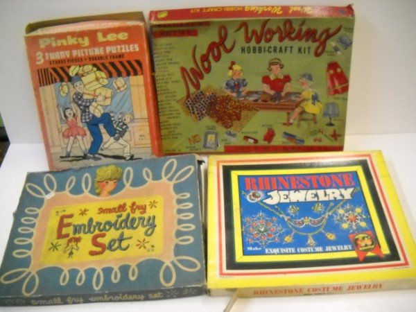 TOYS: 4 TOYS INCLUDE WOOL WORKING HOBBI CRAFT KIT; RHINSTONE COSTUME JEWELRY; SMALL FRY EMBROIDERY SET; PUZZLE. BOXES TORN; STAINED; USED CONDITION. LARGEST MEASURES 15 INCHES