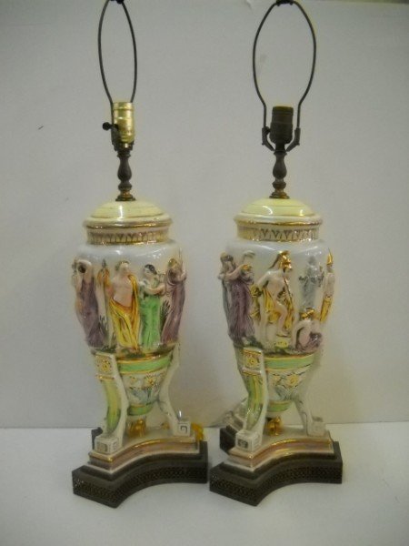 CAPODIMONTE LAMPS: PAIR OF CAPODIMONTE LAMPS. 31 INCHES HIGH X 9 INCHES WIDE. CALL 845-457-7550 OR EMAIL STERLINGAUCTION@AOL.COM FOR FULL CONDITION REPORT, SHIPPING/PACKING QUOTES PRIOR TO BIDDING. IF YOU BID WITHOUT CA
