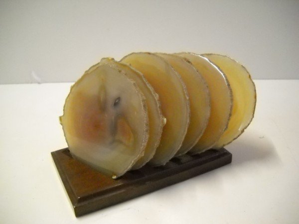 COASTERS: STONE COASTERS WITH HOLDER. BASE MEASURES 6 INCHES X 3 INCHES. CALL 845-457-7550 OR EMAIL STERLINGAUCTION@AOL.COM FOR FULL CONDITION REPORT, SHIPPING/PACKING QUOTES PRIOR TO BIDDING. PAYMENT MUST BE M