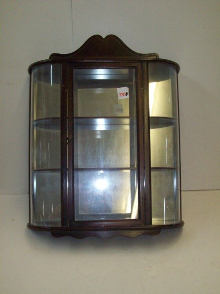 CURIO CABINET: MIRRORED BACK CURIO WALL HANGING CABINET. 19 1/2 INCHES X 24 INCHES. CALL 845-457-7550 OR EMAIL STERLINGAUCTION@AOL.COM FOR FULL CONDITION REPORT, SHIPPING/PACKING QUOTES PRIOR TO BIDDING. PAYMENT MUS