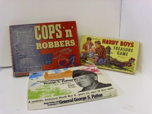 BOARD GAMES: 3 BOARD GAMES INCLUDING HARDY BOYS TREASURE GAME; COPS 'N' ROBBERS 1953; GENERAL GEORGE S. PATTON 1973. USED CONDITION; BOXES STAINED, TORN. LARGEST MEASURES 14 INCHES X 18 1/2 INCHES. CALL 845-457-75