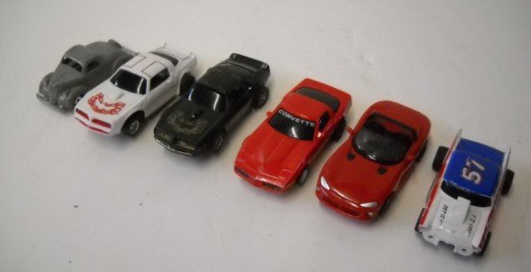 SLOT CARS: 6 SLOT CARS INCLUDING TYCO MADE IN HONG KONG.