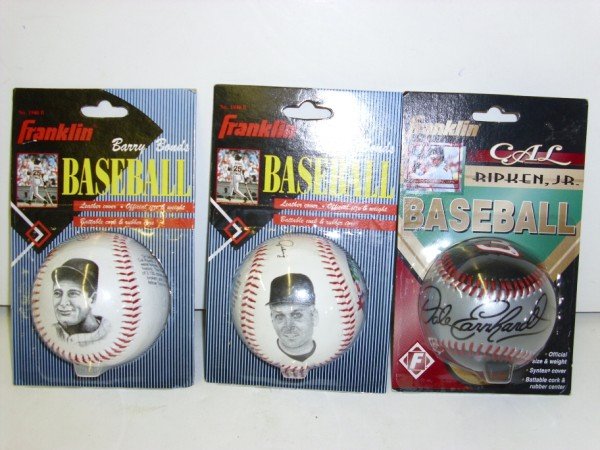 ERROR BALLS: 3 ERROR BASEBALLS. INCLUDING PACKAGE SAYS CAL RIPKEN JR. BUT BALL SAYS DALE EANHARDT.