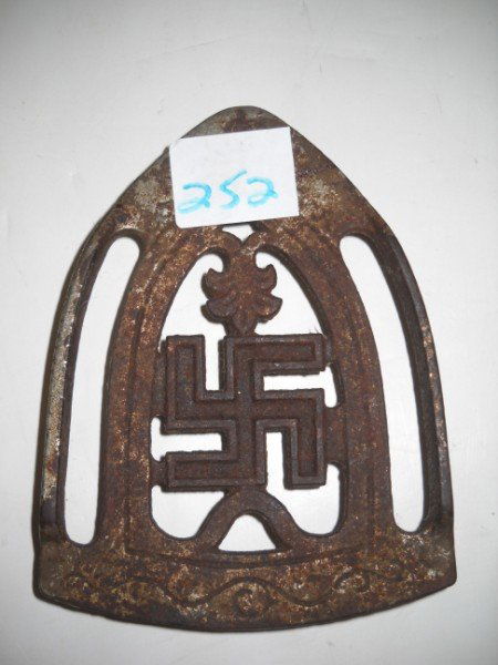 SWASTIKA IRON HOLDER PLATE: SWASTIKA IRON HOLDER PLATE. 6 INCHES.