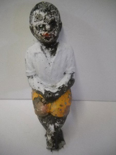 BLACK AMERICANA CONCRETE STATUE: BLACK AMERICANA CONCRETE STATUE BOY FISHING STATUE. PAINT LOSS; FEET CRACKED; LACKING FISHING POLE. 13 INCHES X 6 INCHES